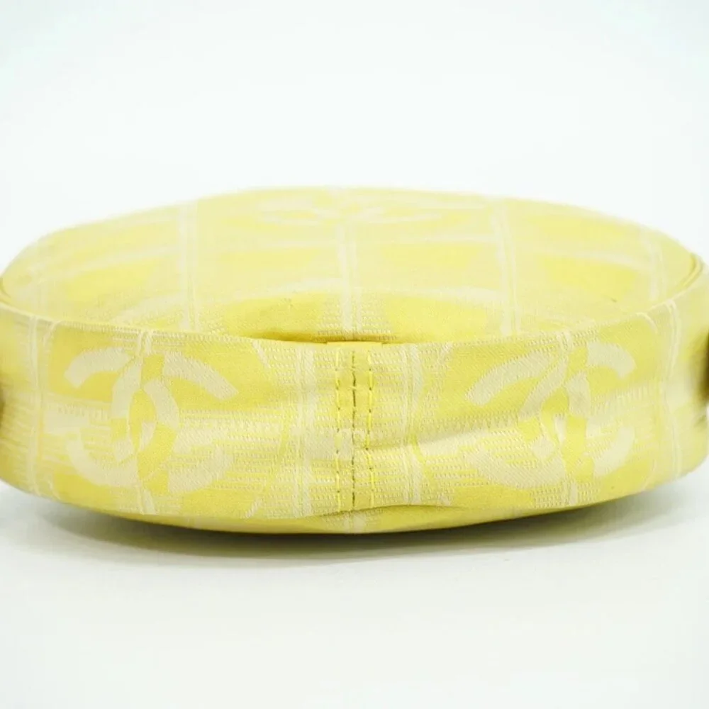 CHANEL New-Travel Canvas Round Mini Pouch Yellow